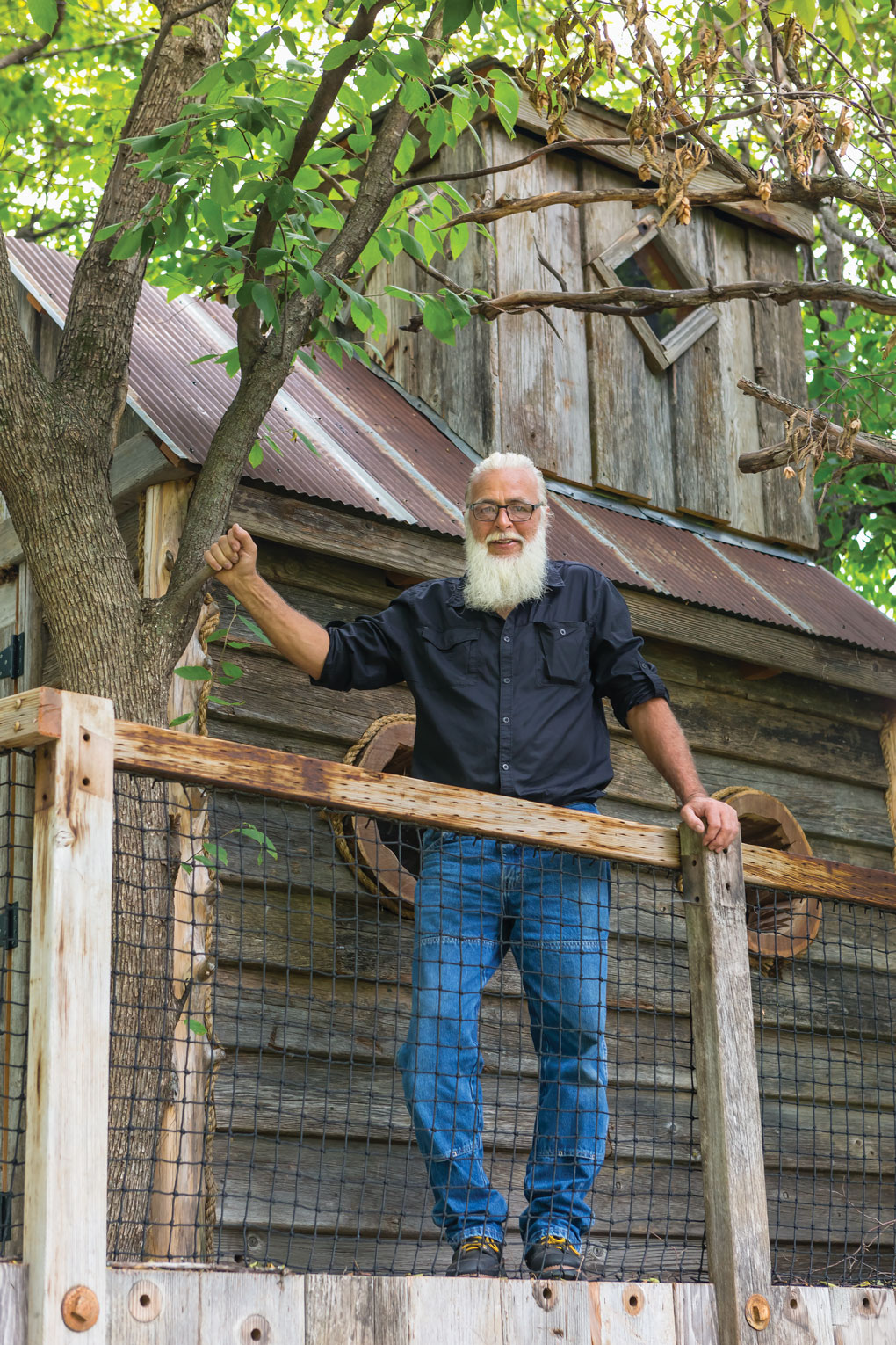 Treehouse and man who built it