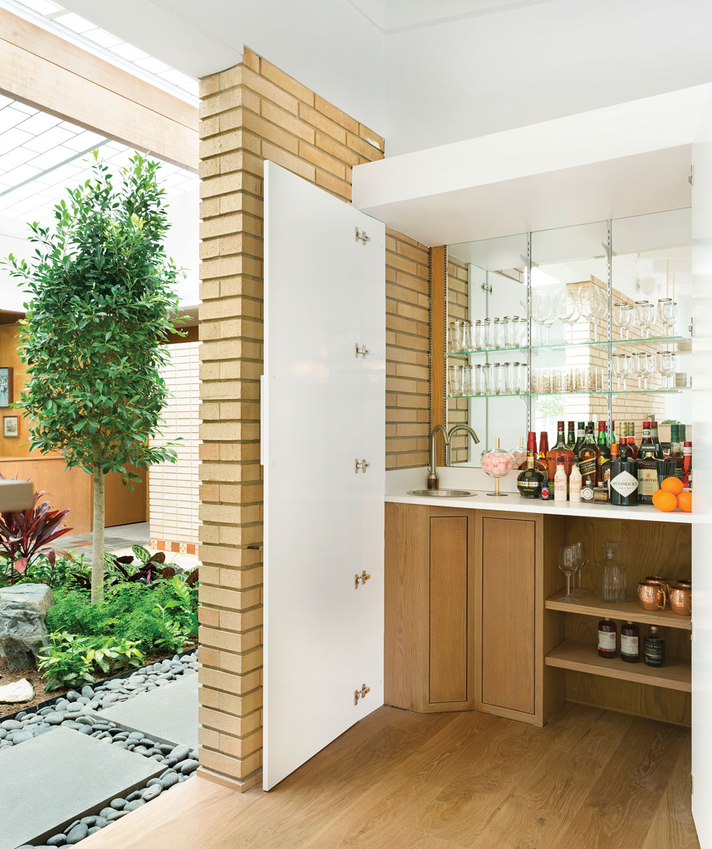 A 1960s-era bar can be found hidden away behind folding doors.