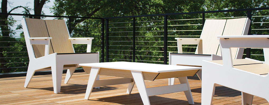 A white coffee table and chairs by 360 Five Designs.