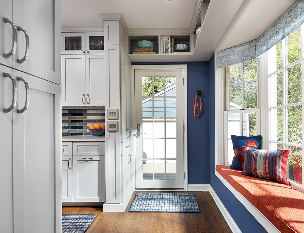 A blue and white entryway in a newly renovated kitchen by LiLu Interiors.