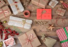 A picture full of wrapped presents displaying different gift wrapping techniques.