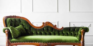 Velvet Furnishings A green velvet sofa.