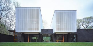 A charcoal-colored brick home built with modern Scandinavian minimalism tone.