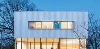 Q+A: Charlie Lazor’s Modern Dwellings Evolve from Flatpak to Stack House The upper picture shows the exterior of a stack house, the lower left photo shows the living room inside the stack house, and the lower right photo is a portrait of Charlie Lazor.