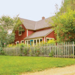 Lynn Steiner on Gardening with Native Plants Lynn Steiner's 1898 red farmhouse is surrounded by lush and colorful greenery.