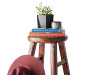 Summer Home Decor An antique round stool by HomeGoods.