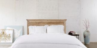 SOL Organics Luxury Bedding A master bed outfitted with white linens from SOL Organics.