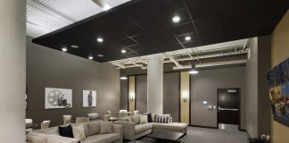 2017 Luxury Loft & Condo Tour: 333 on the Park interior shot of entertainment room with two sectionals and coffee tables, backed by cocktail tables