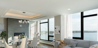 2017 Luxury Loft & Condo Tour: The Lakes living room with floor to ceiling windows facing the lake