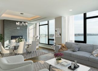 2017 Luxury Loft & Condo Tour: The Lakes living room with floor to ceiling windows facing the lake