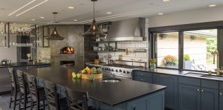 Photo of a renovated kitchen by Erotas Custom Building and Shelter Architecture