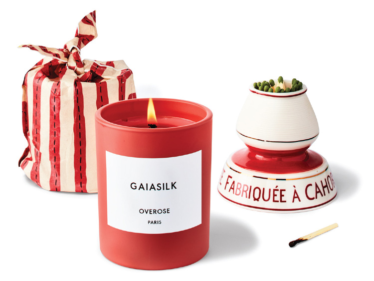 A set of three red candles by Golden Rule and Piccadilly Prairie.