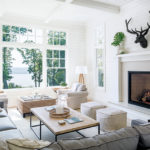 The great room’s comfy chairs are a favorite spot for viewing Lake Pepin.