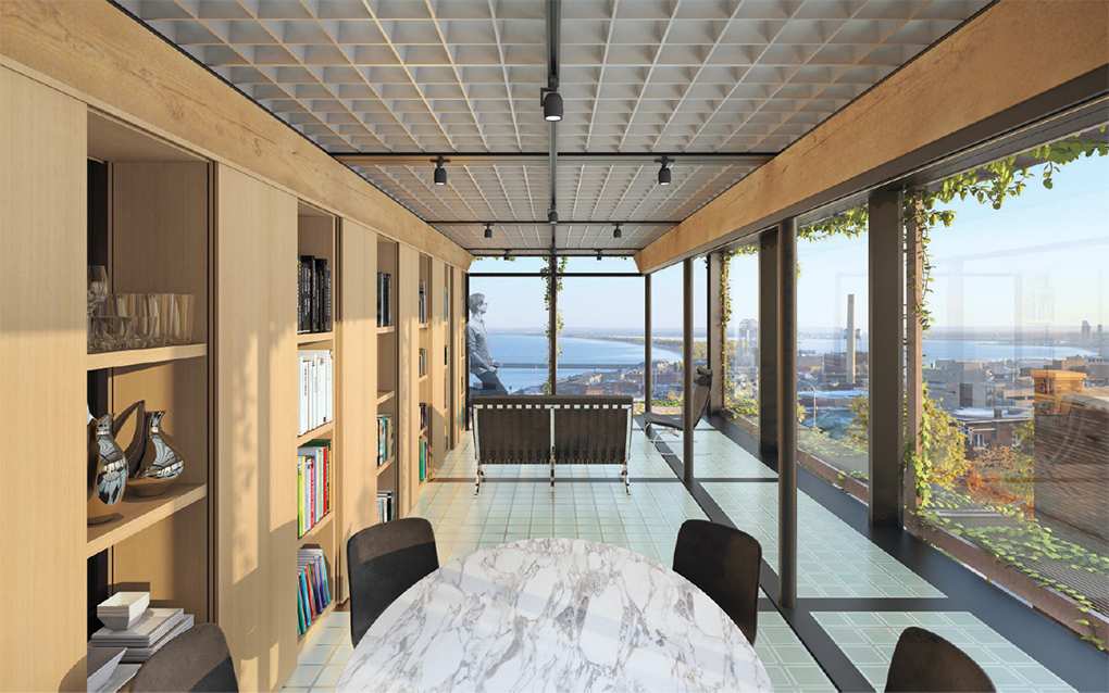 Inside a home with windows for walls overlooking Lake Superior.