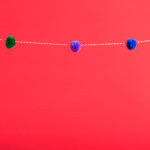 A New Place for Pom Poms Red background with pom pom border