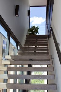 Open staircase in Kroiss Development's Kenwood residence