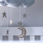 Local Designer Creates a Lasting Spark in a Celebrity Nursery cloud baby mobile with stars and moon