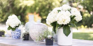 Sales + Events: Aug. 14-19 features a home décor launch and art among the flowers Vases with flowers on a wooden table