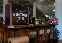 9 New Vendors to Shop at the State Fair Part of Vintage Tin's store front. Wood counter, their logo, and more antique, original trinkets