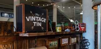 9 New Vendors to Shop at the State Fair Part of Vintage Tin's store front. Wood counter, their logo, and more antique, original trinkets