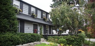 Strolling a Garden of Delights Window boxes overflowing with greenery and a front deck framed in vines are just a few elements showcasing this local couple’s love of the outdoors.
