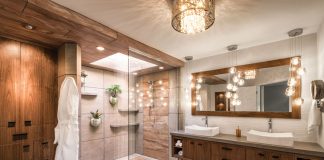 Earthy Glam A newly remodeled bathroom featuring a shower with live plants growing inside that bring nature indoors.