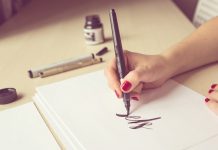Sales + Events: Oct. 9-14 features a calligraphy workshop, fall festivals, and a Midwest Home mingler Hands writing with brush and ink, the lettering process. Concept creativity and calligraphy, light background, toning