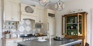 Period Pieces Two kinds of surfaces in this kitchen surround the range: butcher block, for cooking, and soapstone, for baking. Designed by Jacqueline Fortier Studio.
