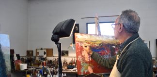 Sales + Events: Dec. 11-16 features a holiday get-together, Minnesota-inspired pop up, and cash-and-carry art sale Man painting in studio
