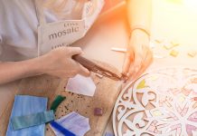 January 2019 DIY Class Calendar Hands working on new modern colorful mosaic at workshop.