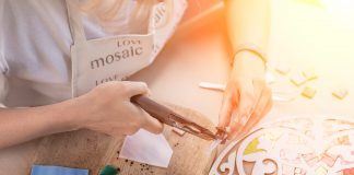 January 2019 DIY Class Calendar Hands working on new modern colorful mosaic at workshop.