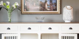 7 Home and Garden Features For Your Pup Photo of dog crate built into furniture