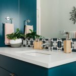 Image of bathroom sink and tile backsplash