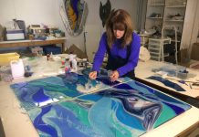Q + A: Bonnie Rubinstein Shares Her Passion for Fused Glass A woman creates artwork using colored glass