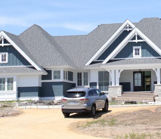 The gables and columns give just a hint of the traditional molding and details of this new build.