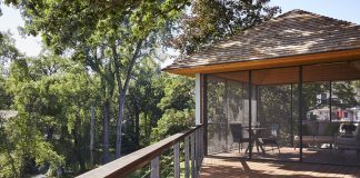 A Porch Among the Trees Christopher Strom's design is open and airy for this couple's creekside screen porch.