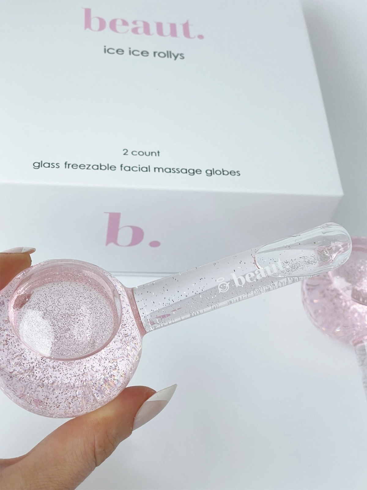 Ice rolys for the face, in light pink.
