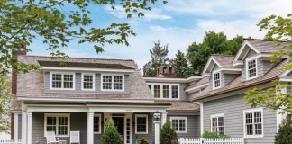Landschute Large sprawling grey home on Lake Minnetonka