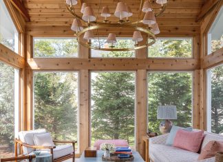 Midwest Design’s Top 5 Featured Projects in 2025 The existing home’s new 275-square-foot pine sunroom features a patterned sofa and powder blue cocktail table, a pair of 1960s French bamboo chairs, and a two-tiered chandelier in antique burnished brass that dangles overhead.