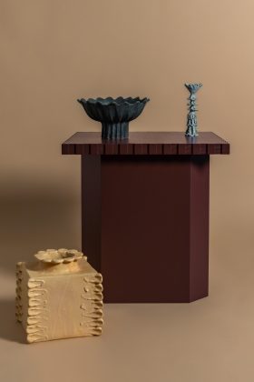 End table from Brunel furniture collection with ceramic accessories