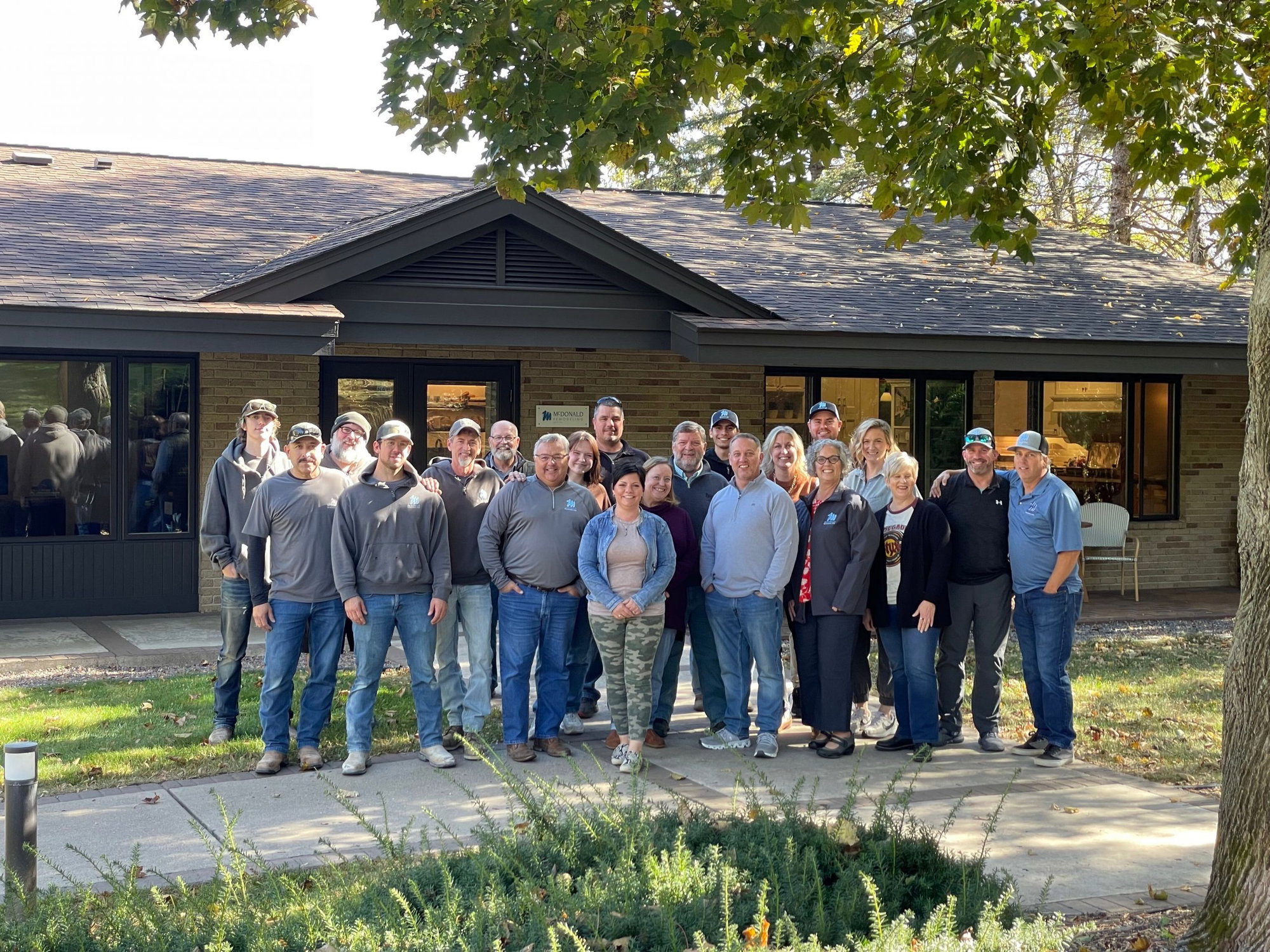 Members of the McDonald Remodeling team pose as a group