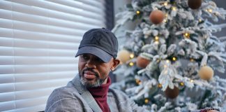 Houston White Celebrates Heritage and Soul This Holiday Season Houston White is pictured in the living room of one of the units in Camdentown Flats, his latest housing development project in North Minneapolis.