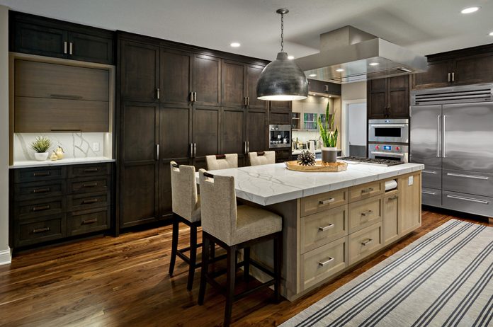 dark wood cabinets with stainless steel and island