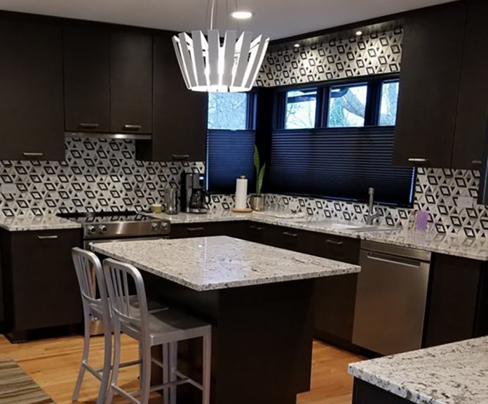 dark-wood-cabinets-navy-blacksplash-kitchen