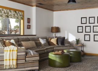 Vintage Items Bring Heirloom Energy to This New Cabin Interior of a cabin featuring vintage furnishings