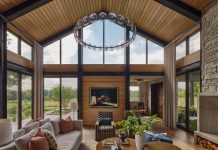 3 Contemporary Living Rooms That Encourage Togetherness The great room of this Orono home features floor-to-ceiling windows and natural, inviting elements.