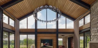 3 Contemporary Living Rooms That Encourage Togetherness The great room of this Orono home features floor-to-ceiling windows and natural, inviting elements.