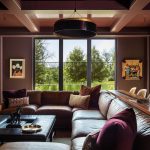 Explore Societal Shifts and Their Effects on Design ASID says quiet luxury is giving way to saturated color. We see this in projects like this Midwest Design Award winner (Use of Color) from Hendel Homes. The living space is drenched in a bold, custom merlot tone.