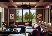 Explore Societal Shifts and Their Effects on Design ASID says quiet luxury is giving way to saturated color. We see this in projects like this Midwest Design Award winner (Use of Color) from Hendel Homes. The living space is drenched in a bold, custom merlot tone.