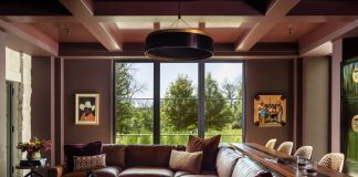 ASID says quiet luxury is giving way to saturated color. We see this in projects like this Midwest Design Award winner (Use of Color) from Hendel Homes. The living space is drenched in a bold, custom merlot tone.